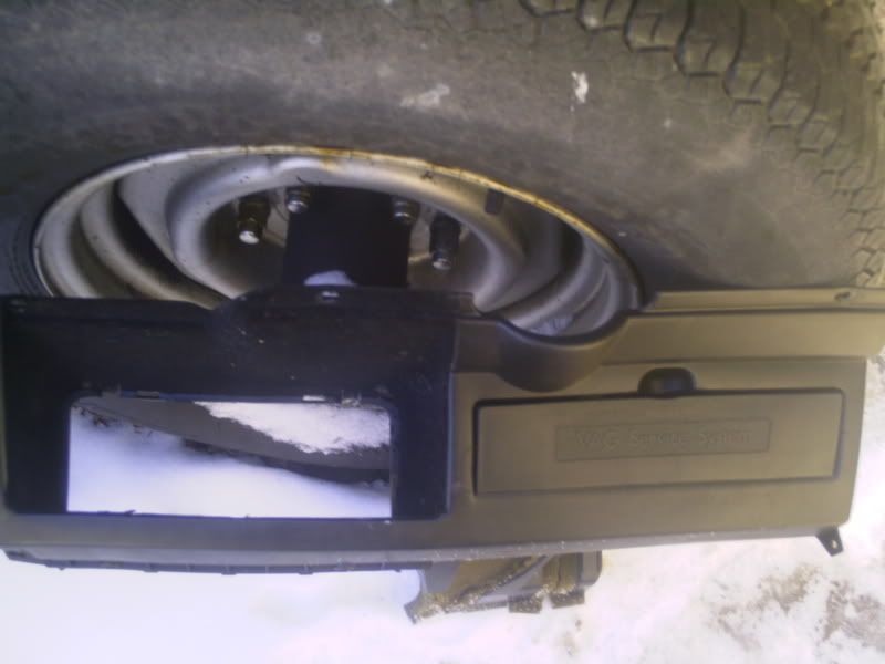 Under dash pockets driver saide and passenger side in black and brown