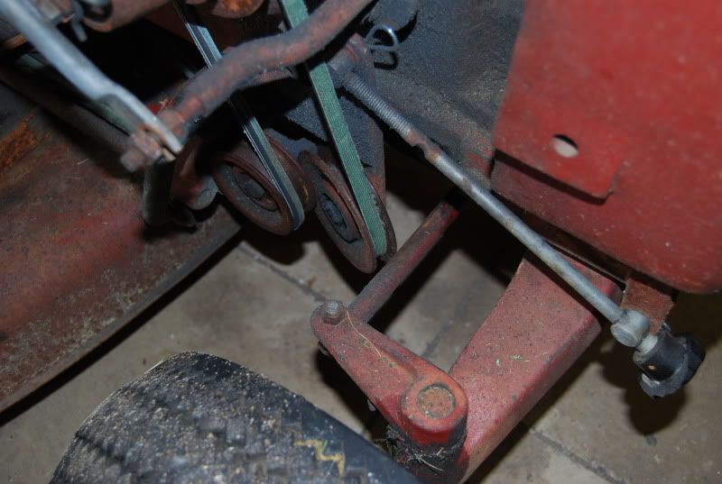 mower deck binds on steering shafts at full lift Implements and