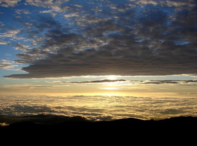 Sun in between the clouds.