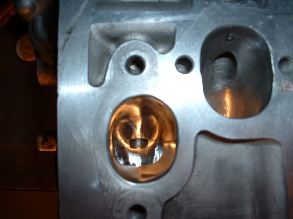 porting and grinding down the valve guides.... Automobiles Forum