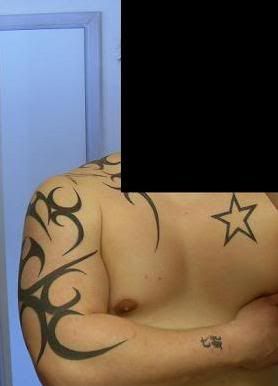 http://i20.photobucket.com/albums/b248/boonzo/tattoo-1.jpg